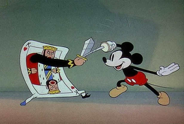 Mickey Mouse sword fighting a King playing card